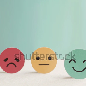Visual representation of emotional scale from unhappy to happy.